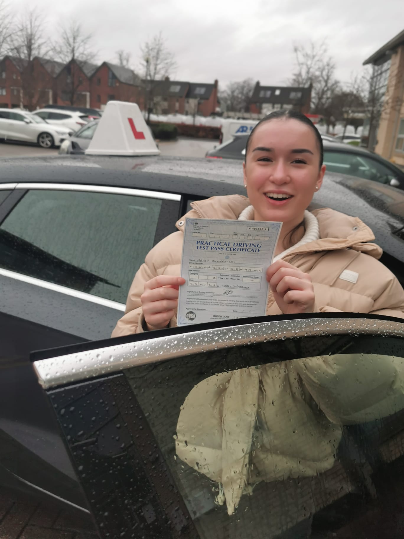 Proud driving test pass - Student celebrating successful completion of driving test